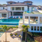 Daytime photo of Isole Villas backyard multi-level private pool