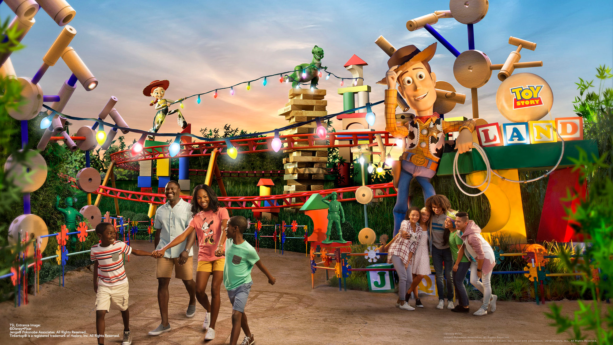 Families at Toy Story Land entrance featuring Woody, Jessie and friends at Disney's Hollywood Studios.