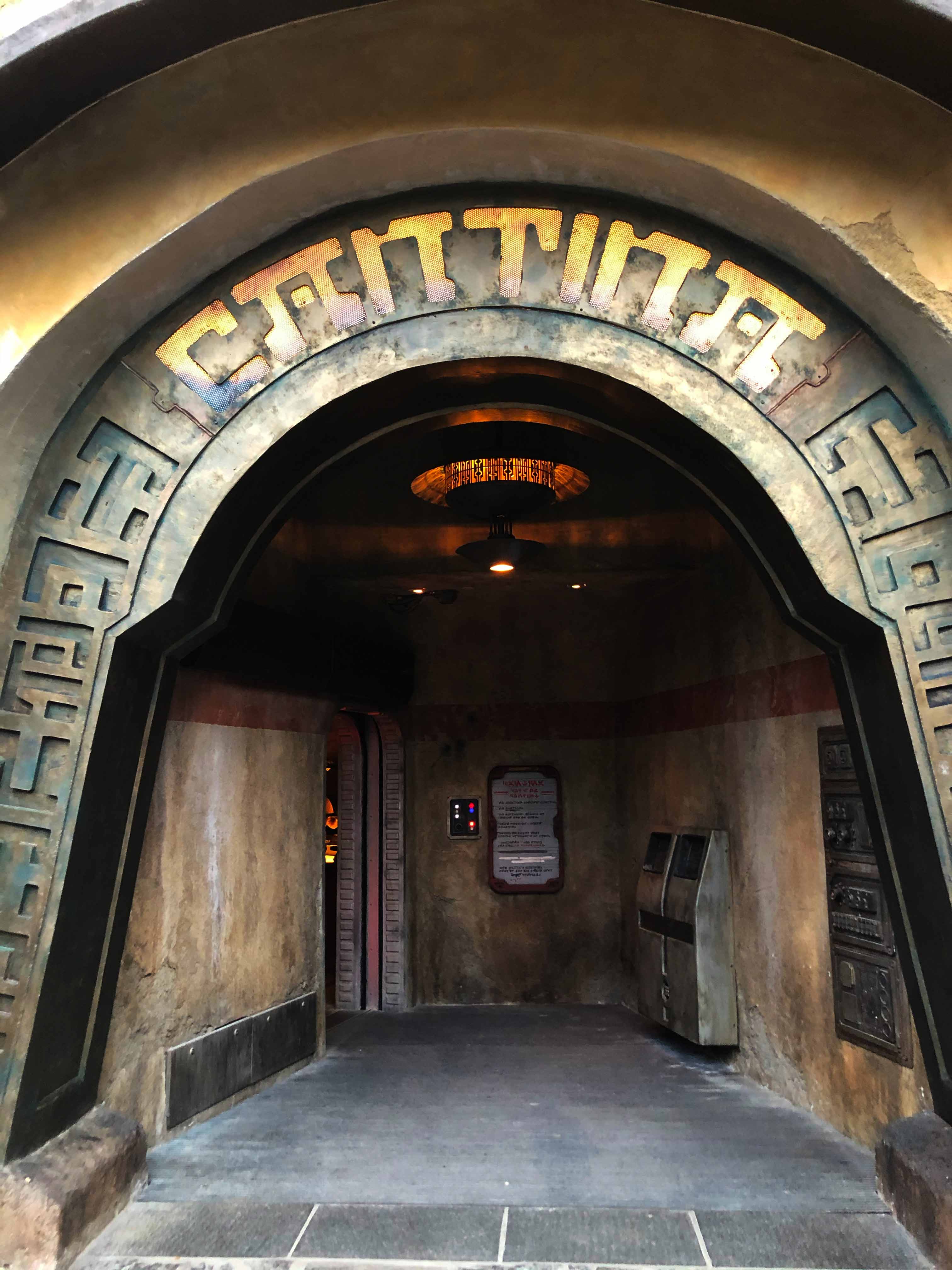 Daytime shot of the entrance to Oga's Cantina at Star Wars: Galaxy's Edge. Disney's Hollywood Studios®, Lake Buena Vista, Florida.