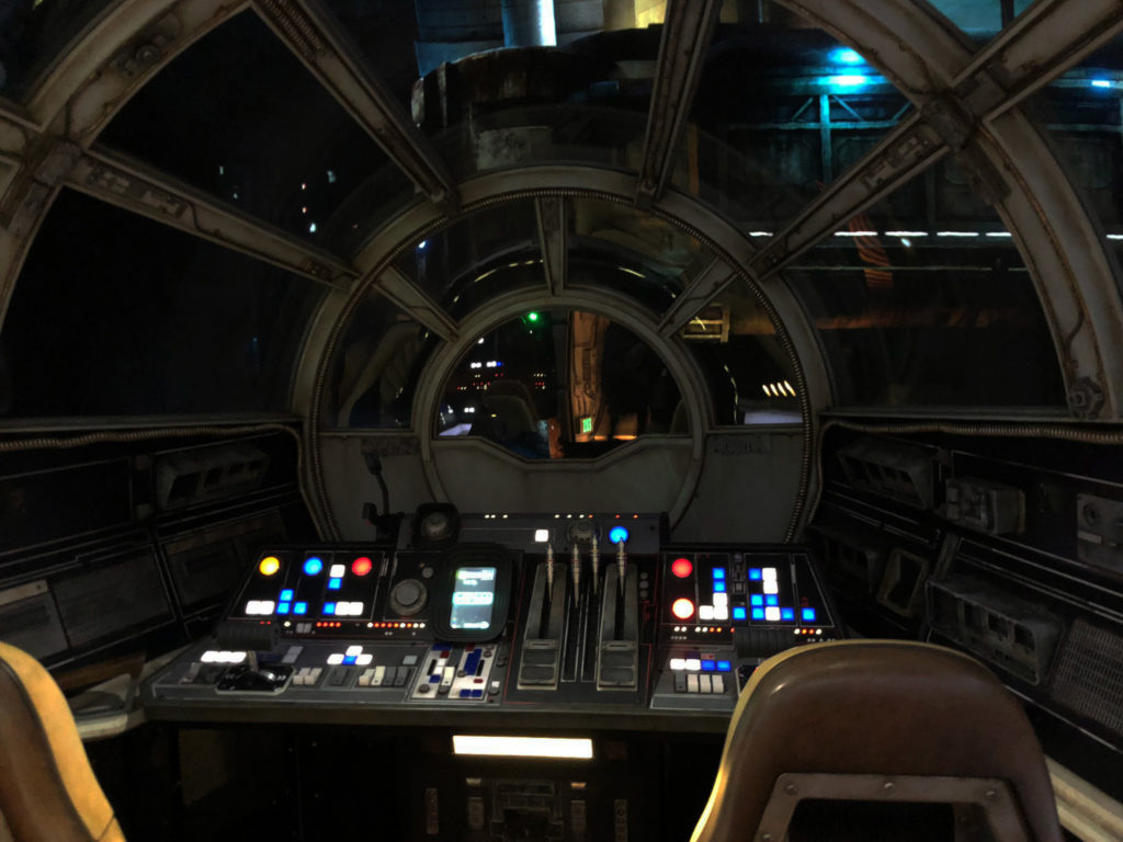 Inside of the Millennium Falcon cockpit before the ride begins on Millennium Falcon: Smugglers Run. Disney's Hollywood Studios®, Lake Buena Vista, Florida.