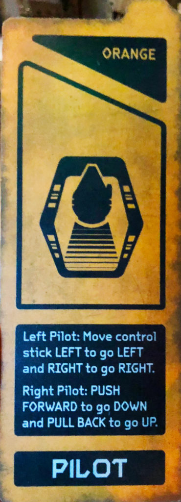 Orange pilot tag on the Millennium Falcon: Smugglers Run ride inside of Star Wars: Galaxy's Edge at Disney's Hollywood Studios®. Lake Buena Vista, Florida.