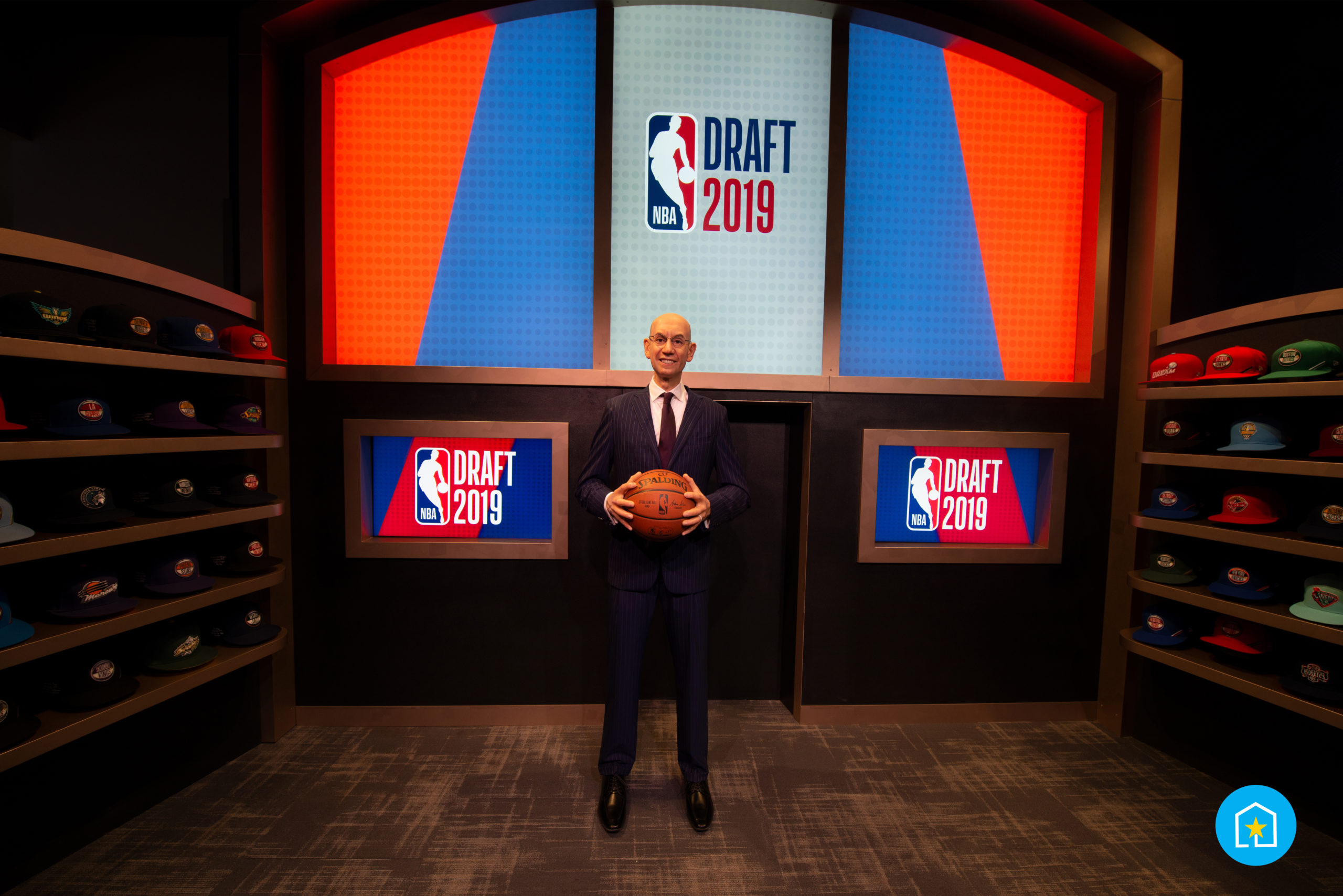 Mannequin of male NBA drafter holding a basketball for a "NBA Draft 2019" photo-op inside of the NBA Experience at Disney Springs® (Lake Buena Vista, FL).