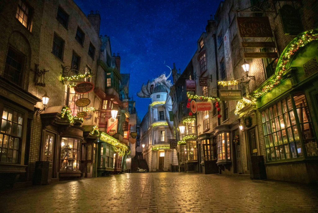 Nighttime shot of an empty Diagon Alley decorated for Christmas season in Universal Studios Florida.
